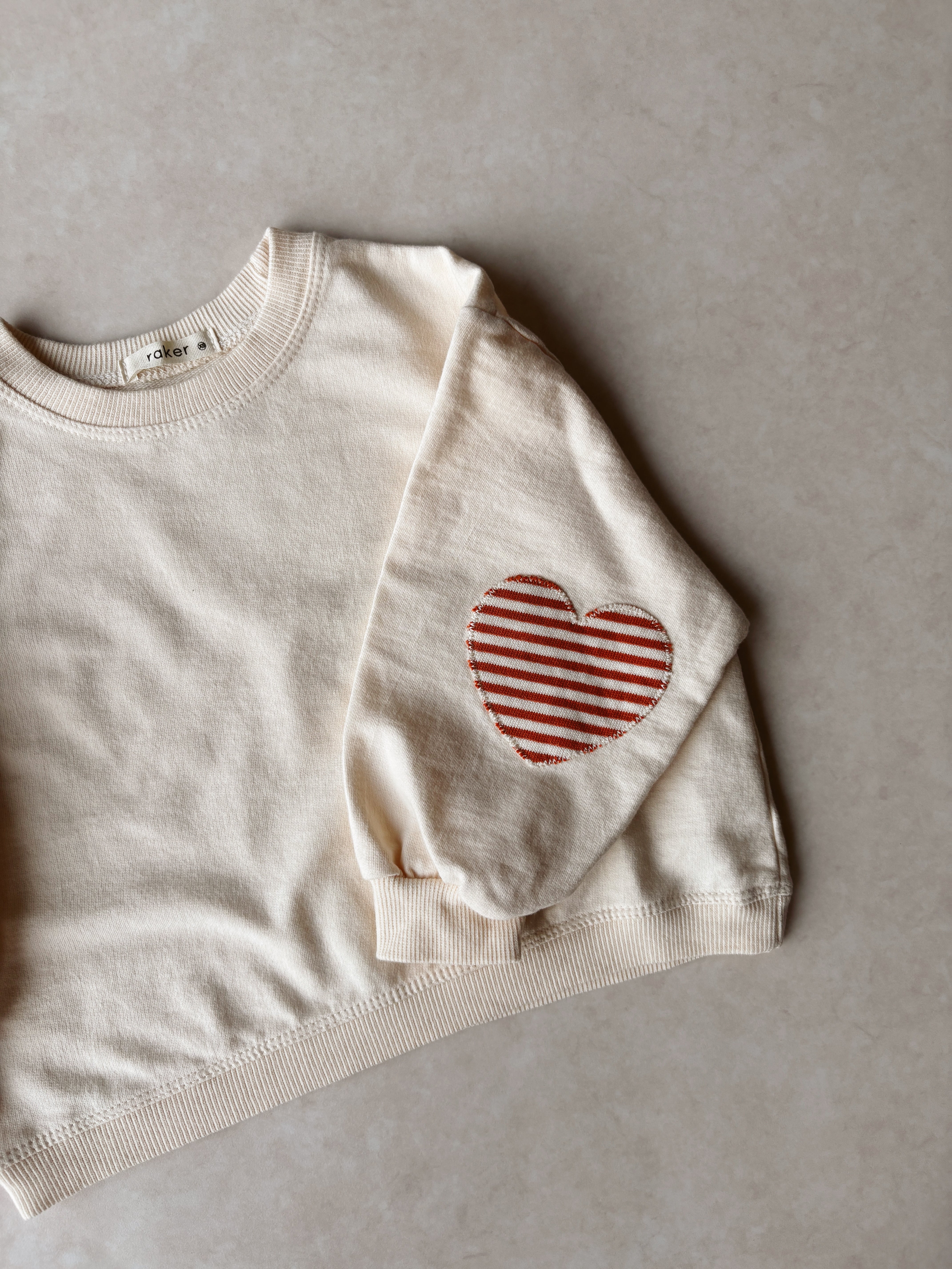 Heart Sleeve Sweatshirt