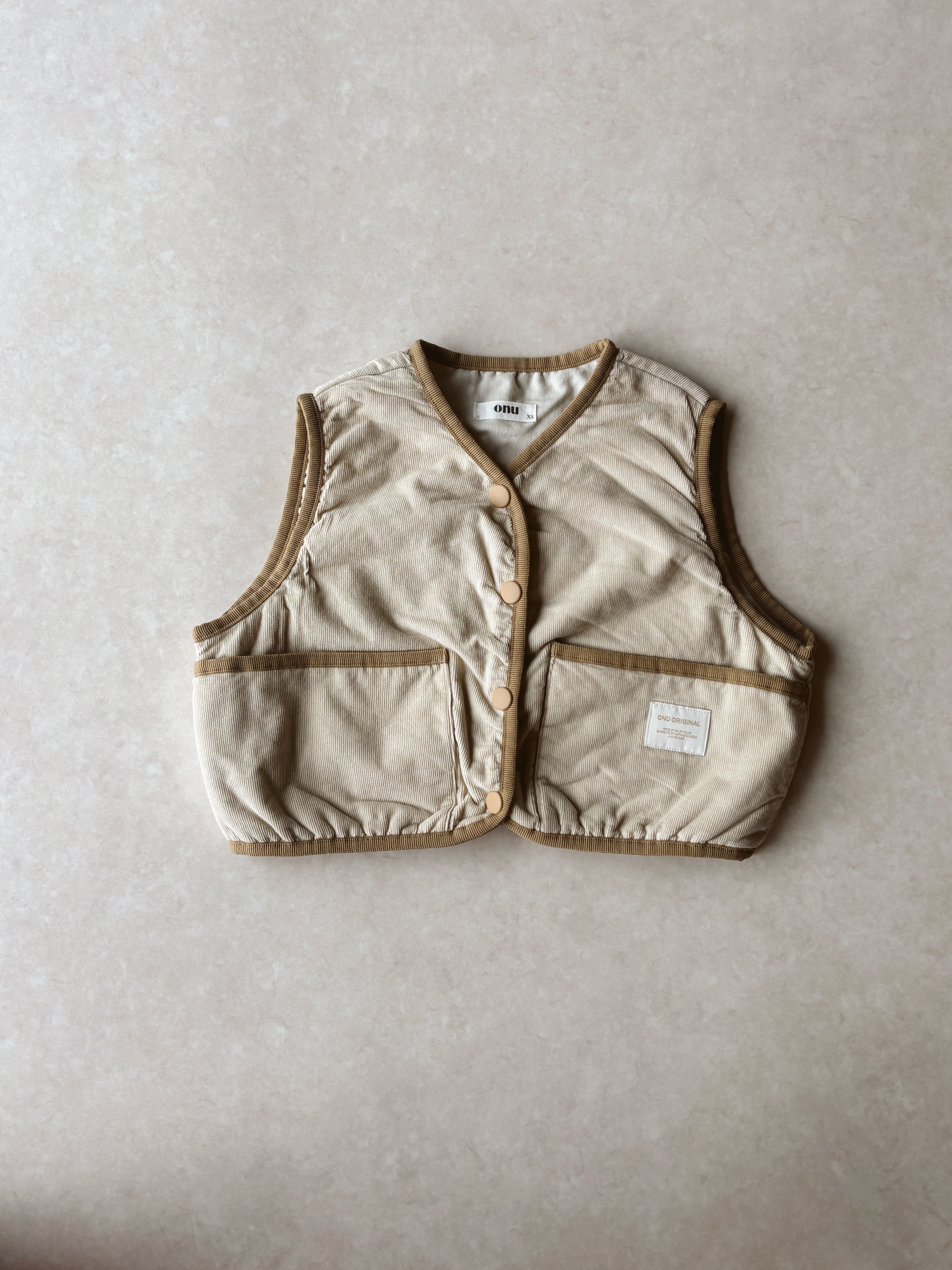 Peach quilted vest