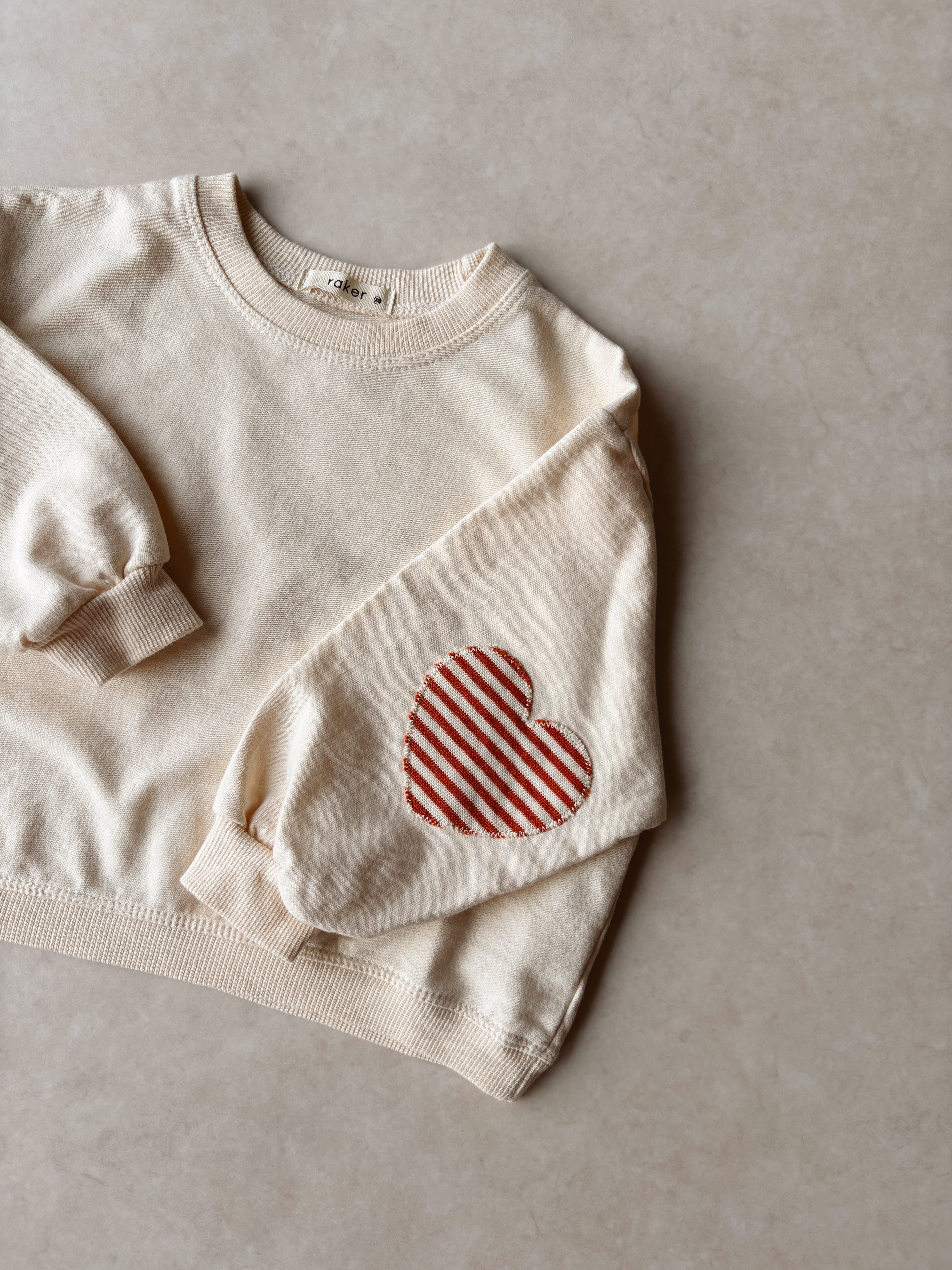 Heart Sleeve Sweatshirt